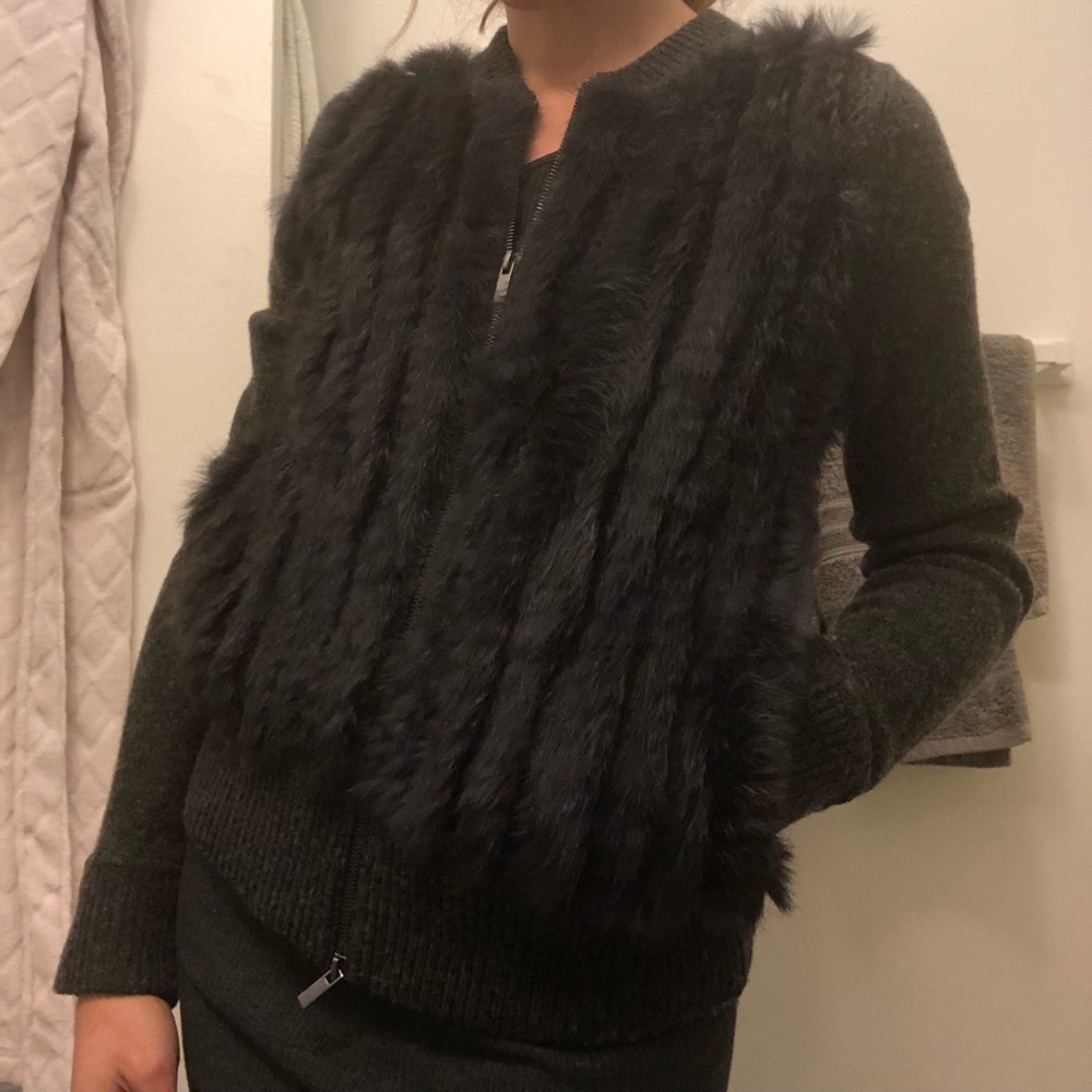 Warm sweater with dark blue rabbit fur.